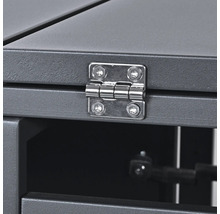 Gros plan d'une charnière de meuble sur un meuble gris