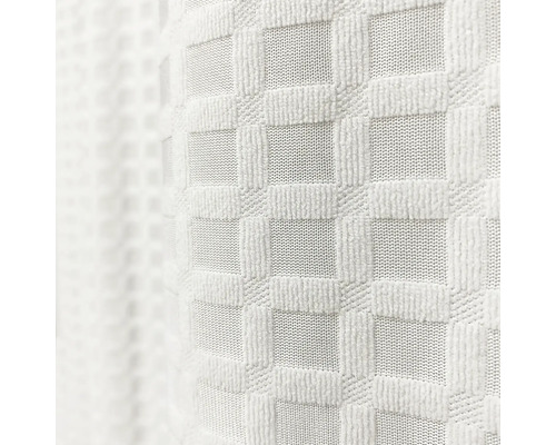 Gros plan d'un tissu de rideau blanc avec motif en damier