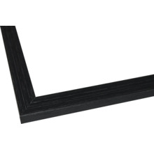 Gros plan d'un cadre photo en bois noir