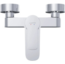 Logo Laufen sur un robinet de lavabo à deux poignées