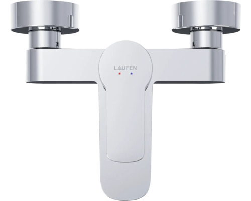 Logo Laufen sur un robinet de lavabo à deux poignées