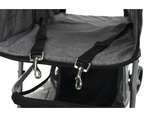 Detailansicht eines Tierwagens mit Gurten und Haken