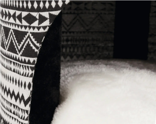 Vue détaillée d'un lit pour animaux avec motif géométrique et rembourrage doux