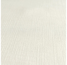 Gros plan d'un papier peint clair et texturé.