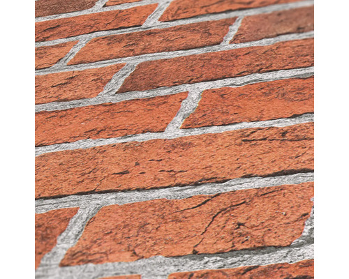 Gros plan d'un mur avec un aspect brique.