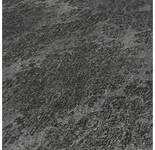 Gros plan d'un papier peint en vinyle gris avec une légère structure