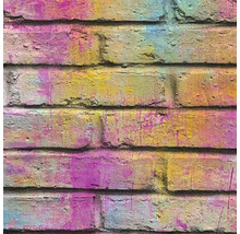 Gros plan d'un papier peint en briques avec des éclaboussures de peinture