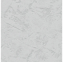 Gros plan d'un mur blanc avec une texture d'enduit