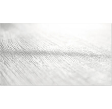 Gros plan d'une surface claire et texturée