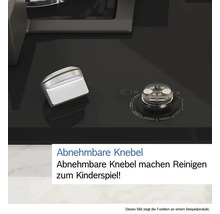 Detailansicht eines abnehmbaren Bedienknopfes auf einem schwarzen Kochfeld