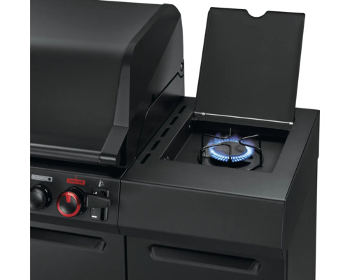 Barbecue à gaz noir avec brûleur latéral en marche