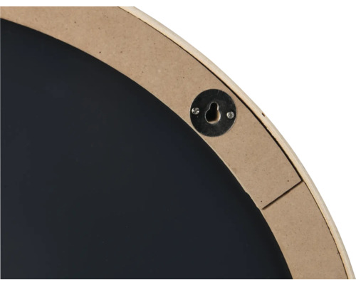 Vue détaillée du dos d'un miroir mural rond avec dispositif de suspension.