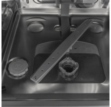 Intérieur d'un lave-vaisselle avec bras d'aspersion, tamis et fermeture