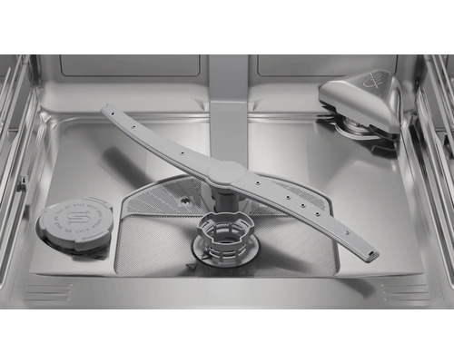 Vue intérieure d'un lave-vaisselle avec bras d'aspersion, réservoir à sel et filtre