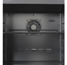 Vue intérieure d'un four avec ventilateur et grille