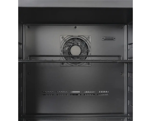 Vue intérieure d'un four avec ventilateur et grille