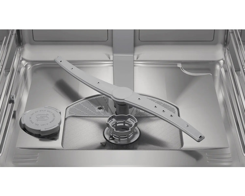 Intérieur d'un lave-vaisselle avec bras d'aspersion, filtre et réservoir à sel