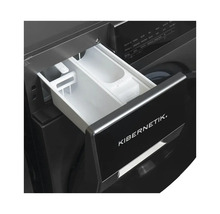 Gros plan d'un lave-linge avec tiroir à lessive ouvert