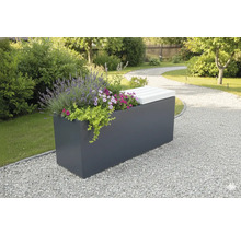 Jardin avec jardinière plantée avec assise