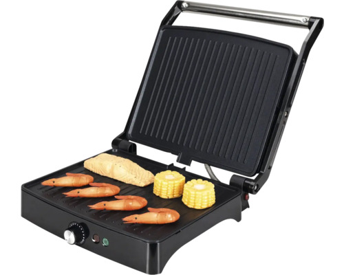 Gril de contact avec crevette, poisson et maïs sur la surface de cuisson