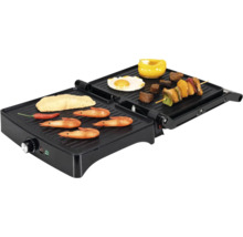 Gril de table électrique avec poisson, crevettes, légumes et brochette.