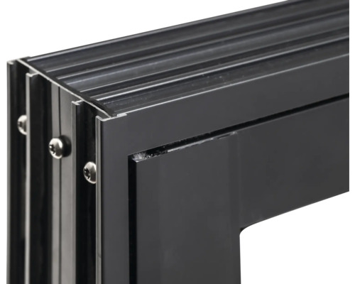 Gros plan d'un cadre en aluminium noir avec vis