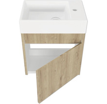 Meuble sous-lavabo avec porte ouverte