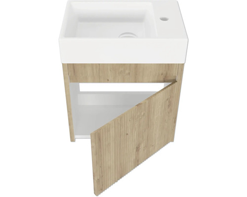 Meuble sous-lavabo avec porte ouverte