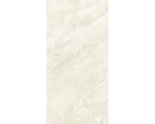 Gros plan d'un carreau de sol avec décor en pierre.