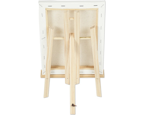 Dos d'une toile sur un chevalet en bois