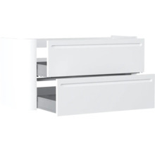 Weisser Waschbeckenunterschrank mit zwei Schubladen und integrierten Griffmulden.