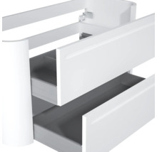 Weißer Waschbeckenunterschrank mit zwei Schubladen und abgerundeter Ecke.
