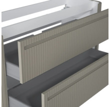 Waschtischunterschrank mit zwei Schubladen und vertikal geriffelter Front.