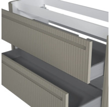 Waschbeckenunterschrank mit zwei Schubladen und vertikaler Rillenstruktur in Taupe.