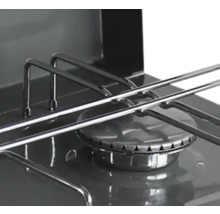 Vue détaillée d'un gril à gaz avec brûleur et grille