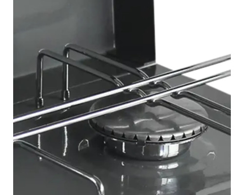 Vue détaillée d'un gril à gaz avec brûleur et grille