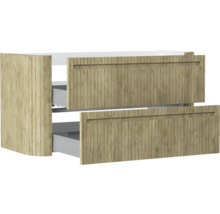 Badunterschrank in Eiche-Optik mit zwei Schubladen und vertikalen Lamellen.