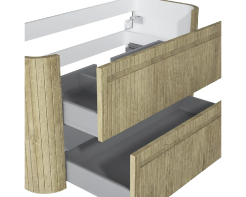 Waschtischunterschrank mit zwei offenen Schubladen und Fronten in geriffelter Holzoptik.
