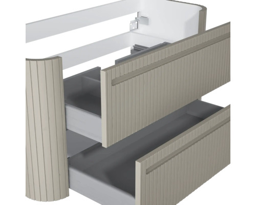 Waschtischunterschrank mit zwei geöffneten Schubladen, geriffeltem Frontdesign und abgerundeten Kanten.