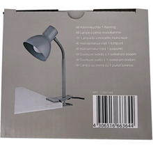 Lampe à pince avec un point lumineux dans l'emballage du produit