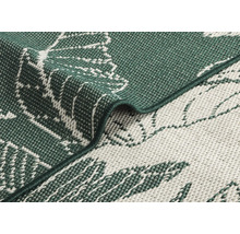 Vue détaillée d'un tapis avec motif de plantes