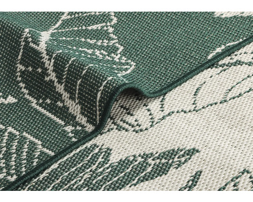 Vue détaillée d'un tapis avec motif de plantes