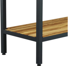 Vue détaillée d'une table avec structure en métal et étagère en bois