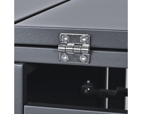 Vue détaillée d'une charnière de meuble avec des vis