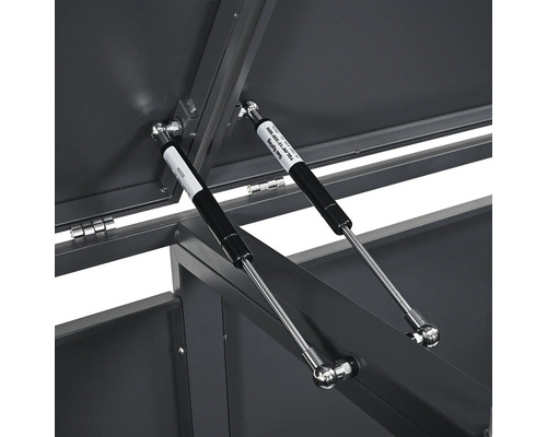 Détail d'un meuble de jardin avec ressorts à gaz