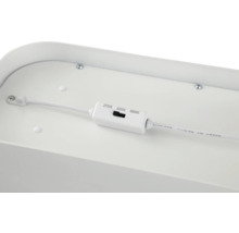 Vue détaillée d'une lampe avec interrupteur pour régler la température de couleur.