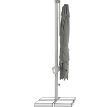 Parasol fermé avec mât et pied de parasol