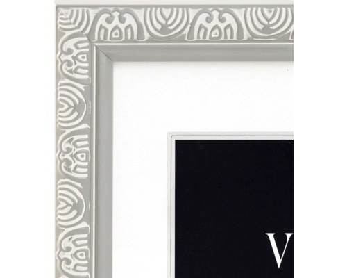 Gros plan d'un cadre photo clair avec motif décoratif