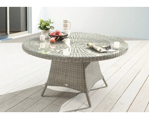 Runder Gartentisch mit Glasplatte, Rattanstruktur und Dekoration