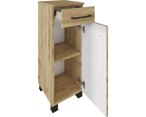 Meuble bas de salle de bains aspect bois avec un tiroir, une porte, des poignées et des pieds noirs.